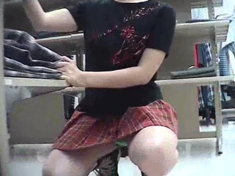 [Voyeur Video] "You can practically see half her pussy here..." Check out this squatting upskirt video that's causing a huge stir online